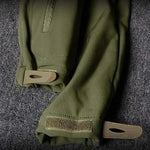 Close-up of men's waterproof fleece jackets showcasing adjustable cuffs and durable fabric for outdoor performance.