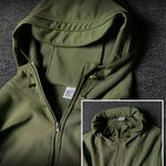 Men's waterproof fleece jackets close-up, showcasing the green hood and zipper details, ideal for outdoor activities.
